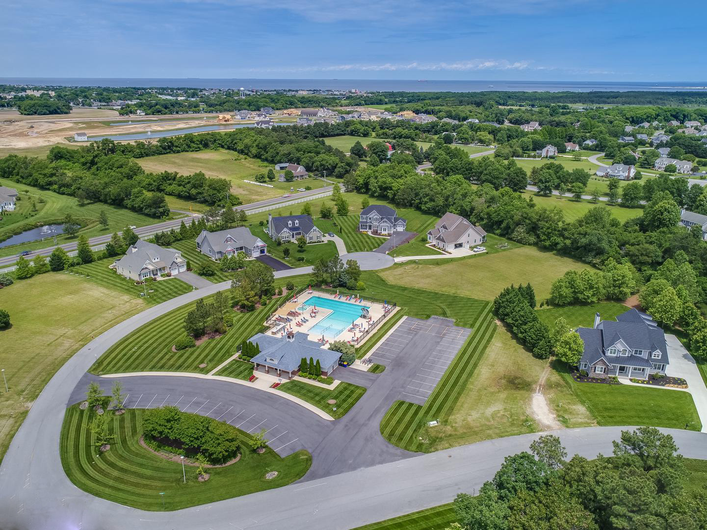 Streets aerial view  and community pool | Hawkseye, Lewes, Delaware HOA Home Owners Association